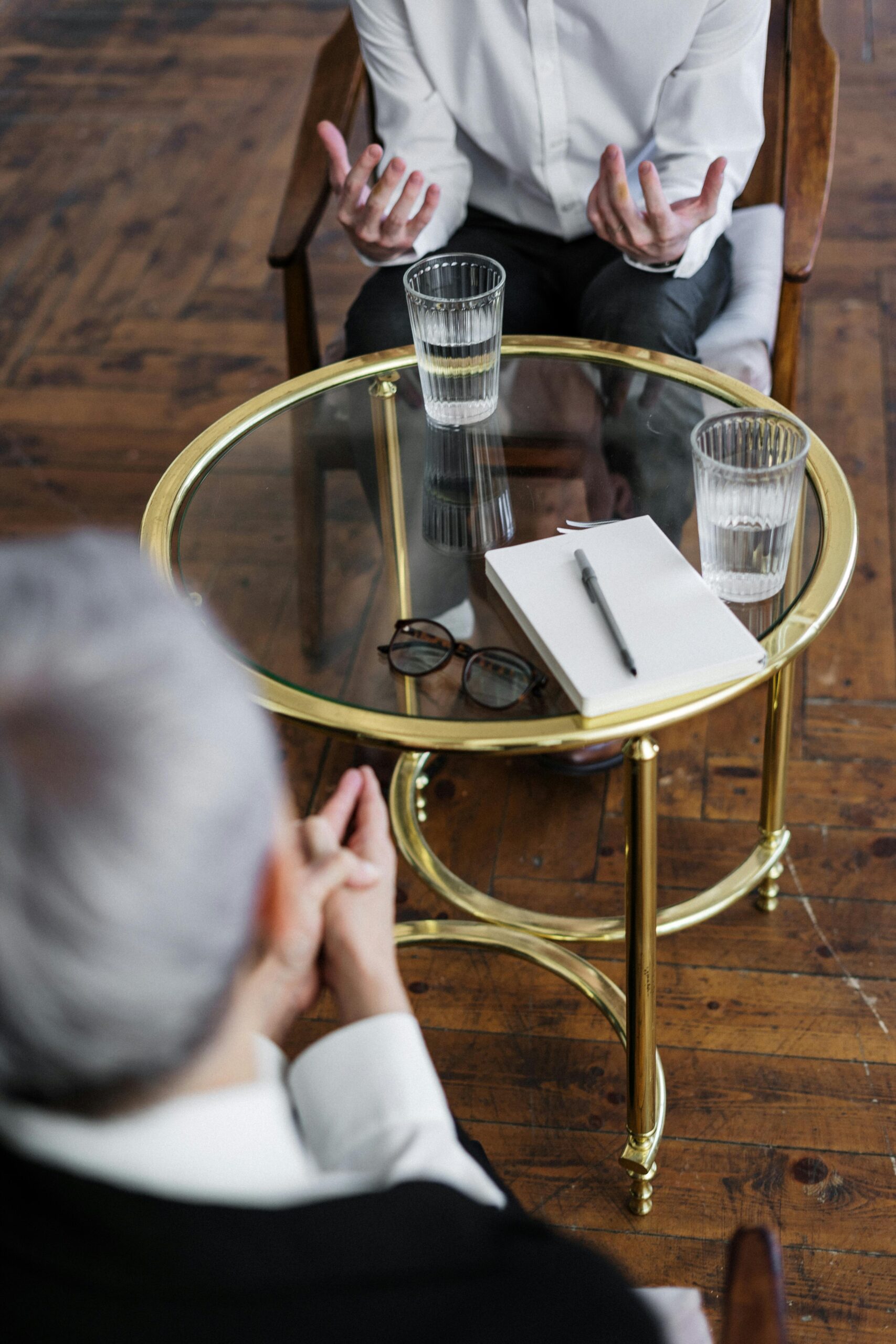 therapist and man receiving Outpatient mental health services